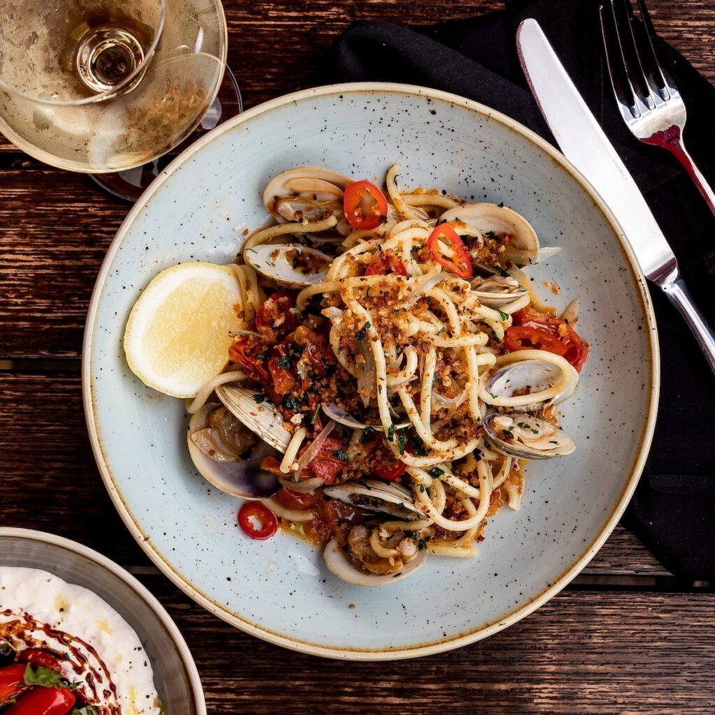 pasta dish on blue ceramic bowl